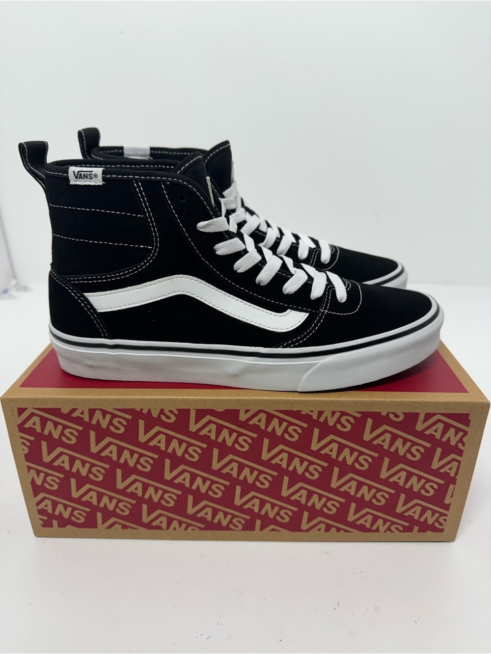 Vans Black and White High-Top Sneakers
